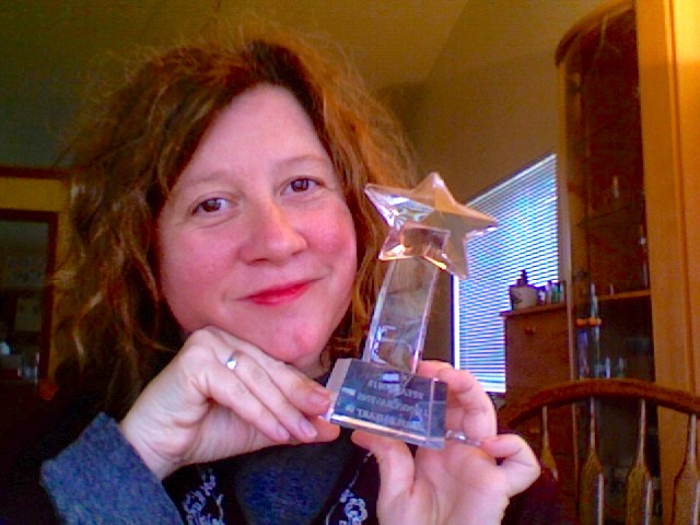 jayne holding
          her small trophy